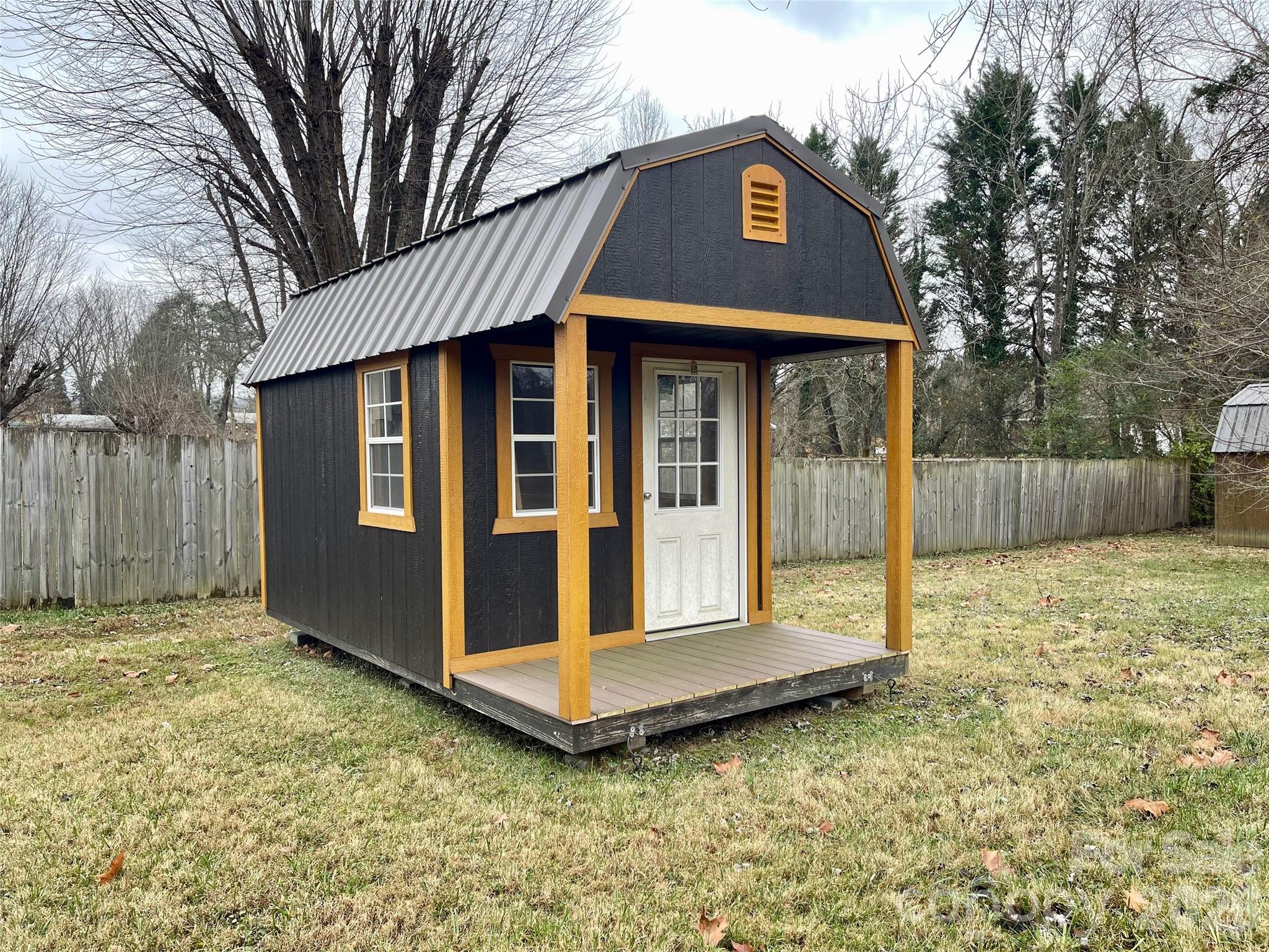 635 Powell Road Northeast Lenoir, NC 28645 - Photo 41 of 48 a front view of a house with a yard