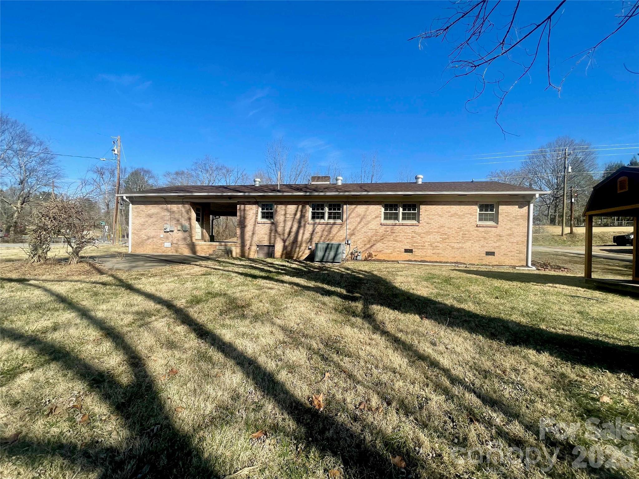 635 Powell Road Northeast Lenoir, NC 28645 - Photo 45 of 48 a view of a swimming pool with a yard