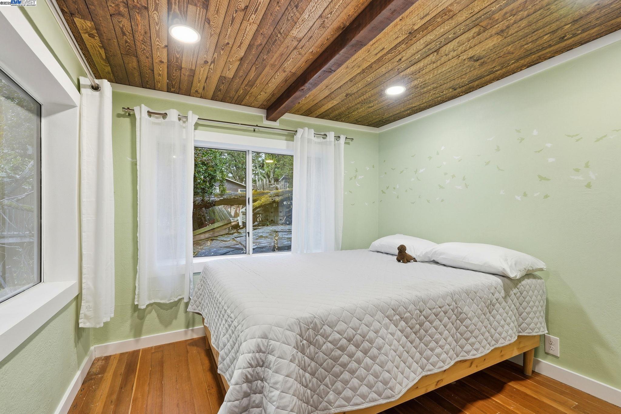 2929 Kilkare Road Sunol, CA 94586 - Photo 25 of 40 a bedroom with a bed and a window