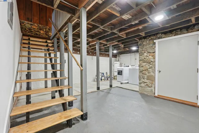 a view of an empty room with windows