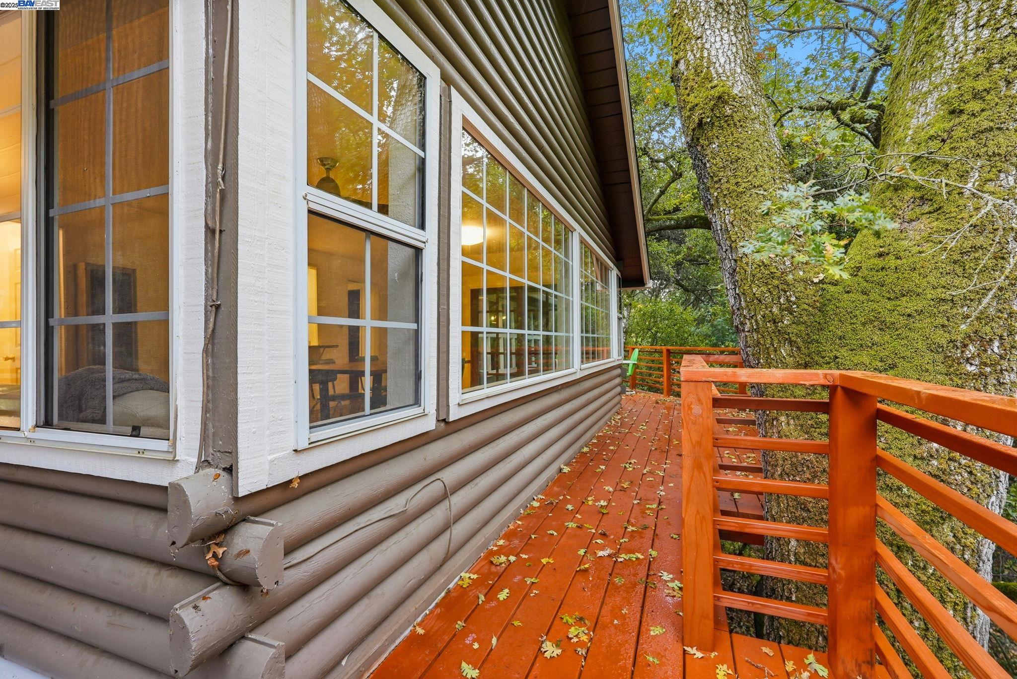 2929 Kilkare Road Sunol, CA 94586 - Photo 34 of 40 a view of a balcony with a large window and wooden fence