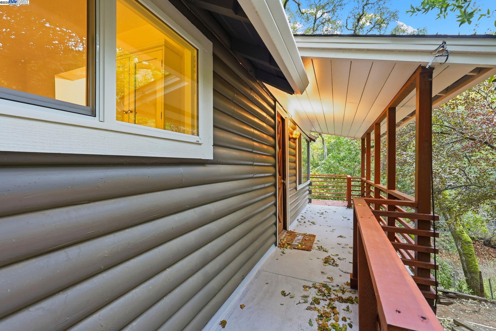 2929 Kilkare Road Sunol, CA 94586 - Photo 7 of 40 a balcony with furniture and a potted plant
