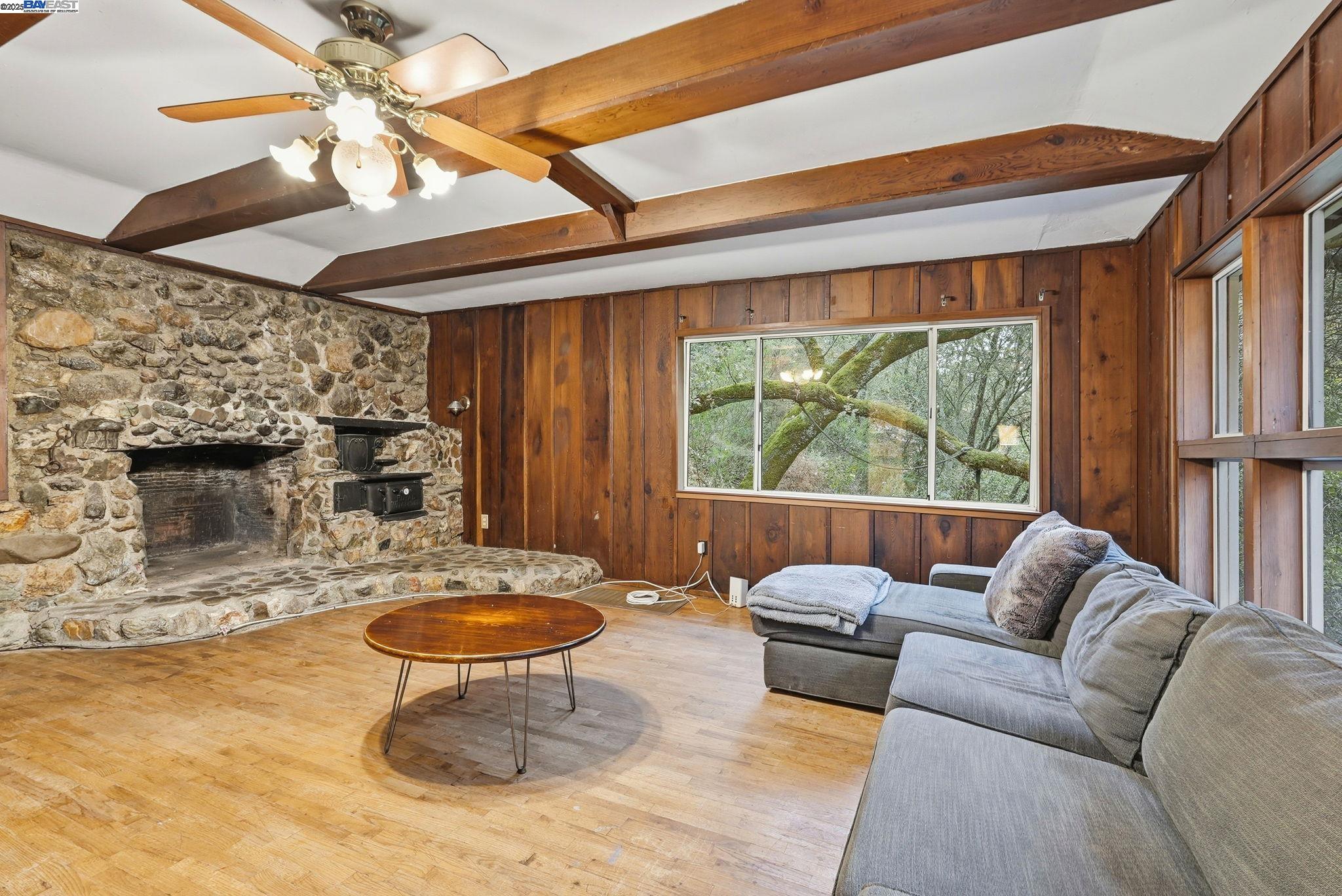 2929 Kilkare Road Sunol, CA 94586 - Photo 10 of 40 a living room with furniture and a fireplace