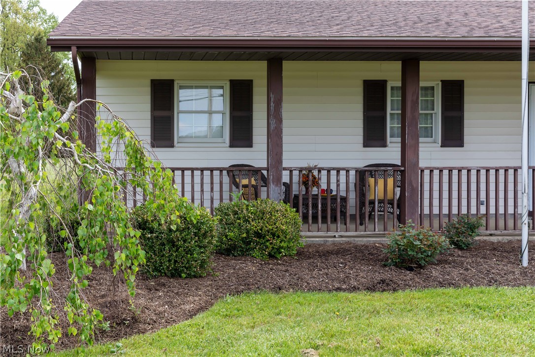 8711 Avon Belden Road North Ridgeville, OH 44039 - Photo 3 of 21 Relax under a fully covered porch