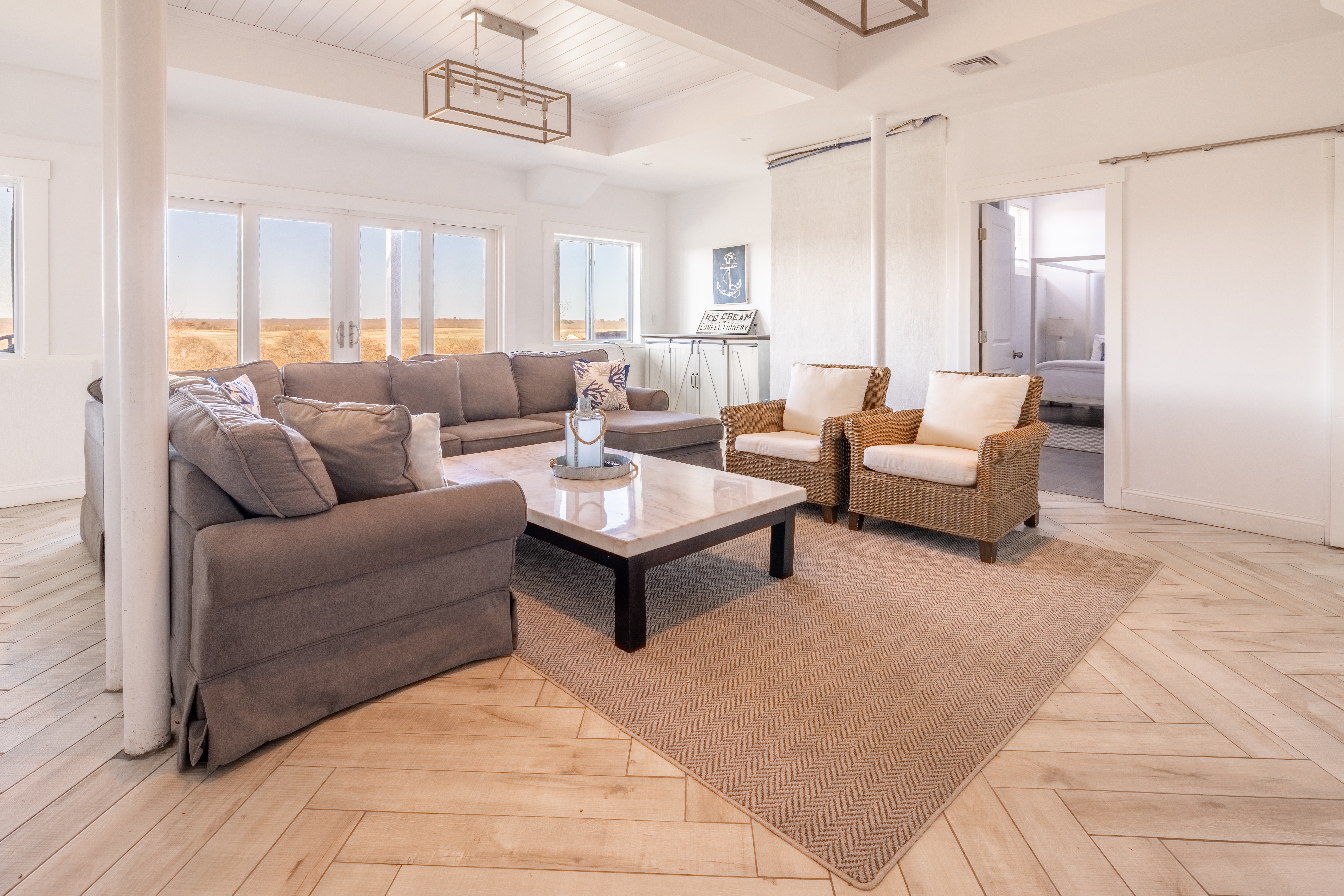 116 Baxter Road Nantucket, MA 02554 - Photo 16 of 28 a living room with furniture and a rug