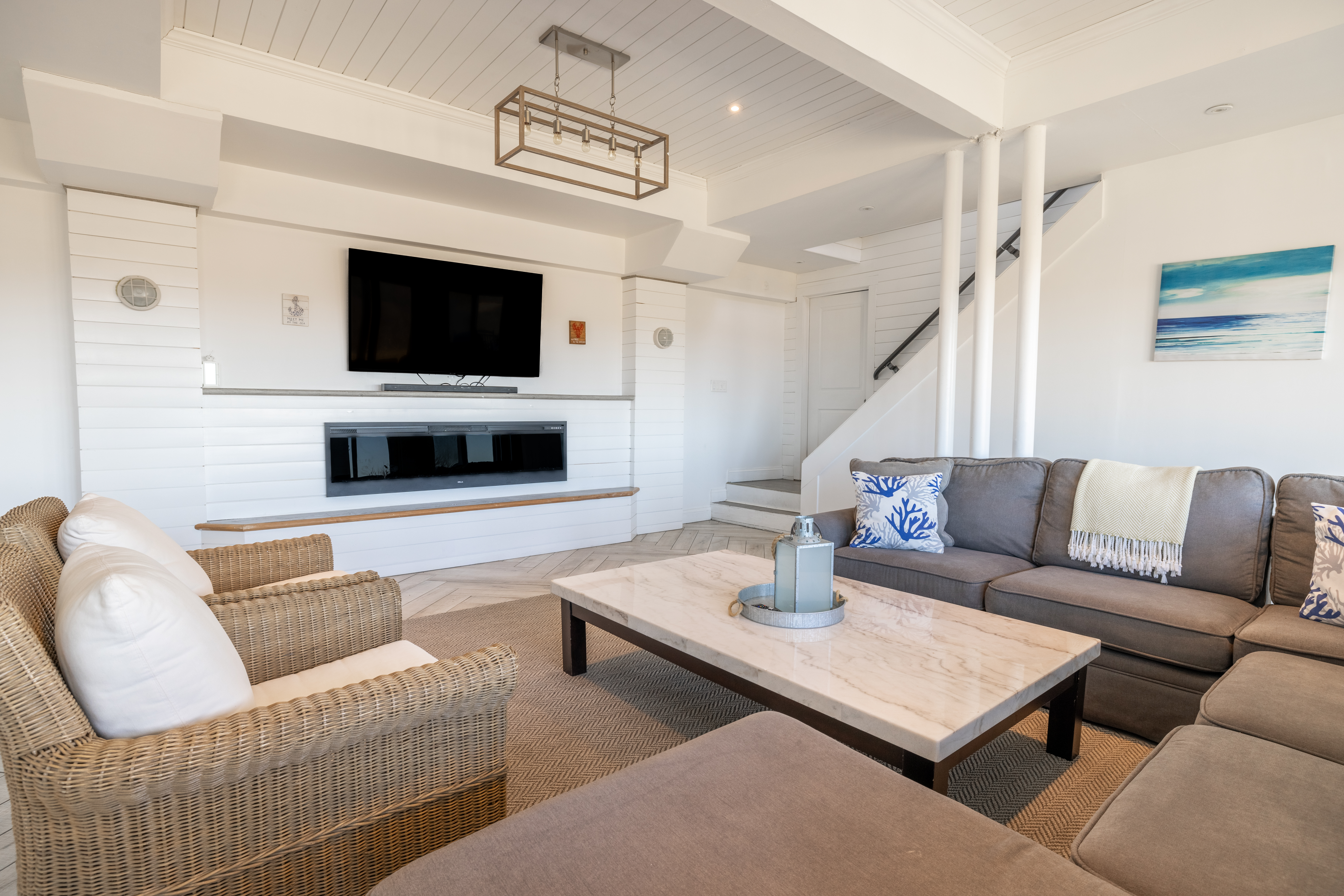 116 Baxter Road Nantucket, MA 02554 - Photo 17 of 28 a living room with furniture and a flat screen tv