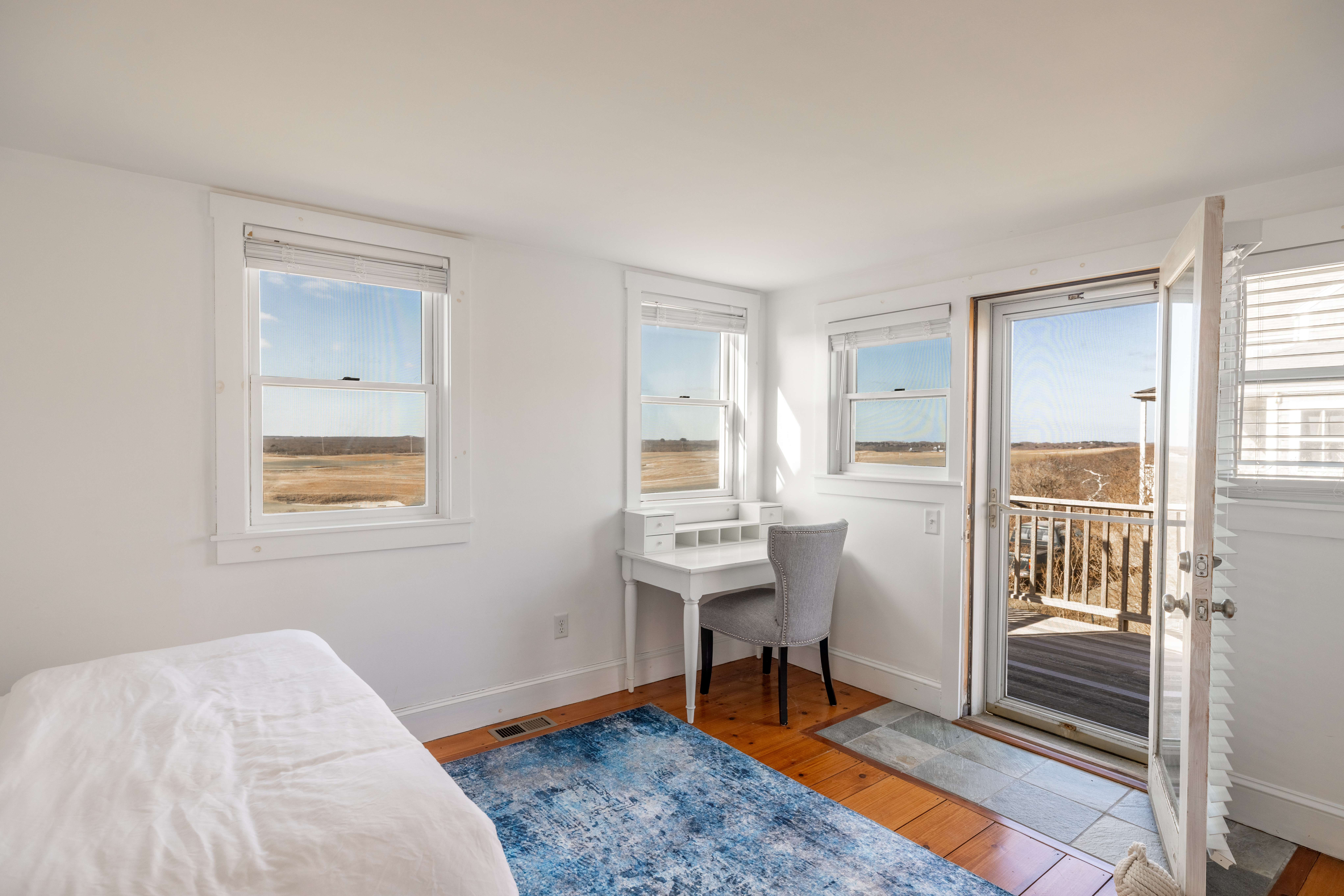 116 Baxter Road Nantucket, MA 02554 - Photo 22 of 28 a view of a livingroom with wooden floor and a window