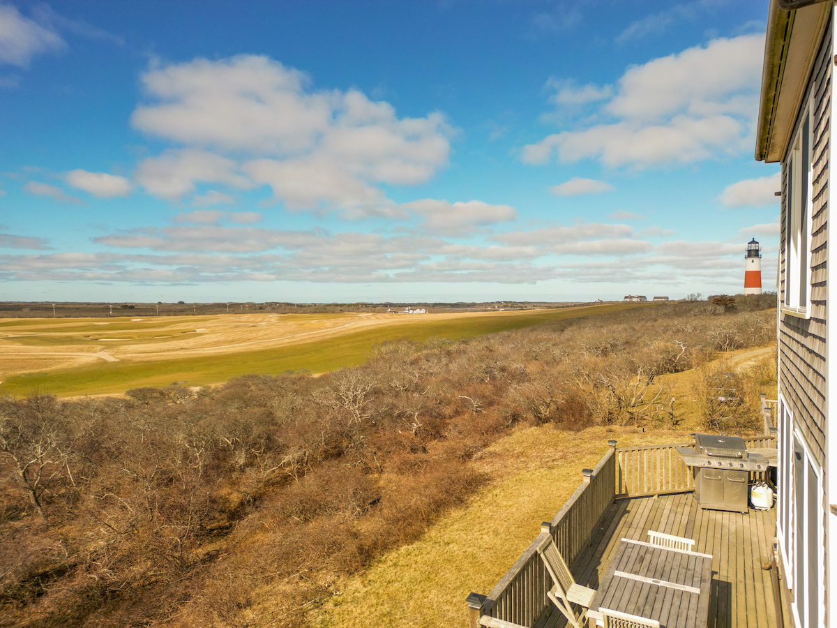 116 Baxter Road Nantucket, MA 02554 - Photo 24 of 28 a view of an ocean and beach