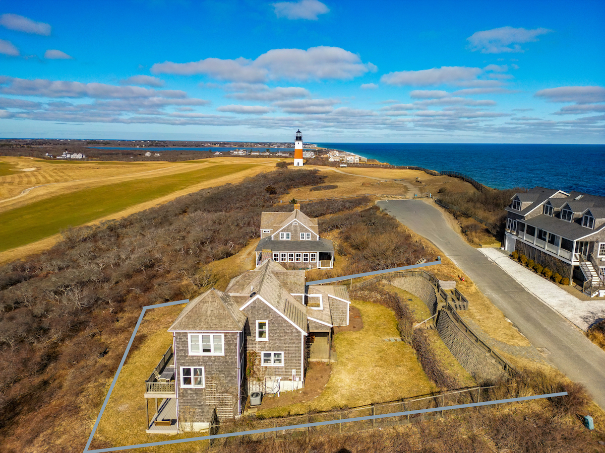 116 Baxter Road Nantucket, MA 02554 - Photo 28 of 28 a view of a swimming pool with an ocean view