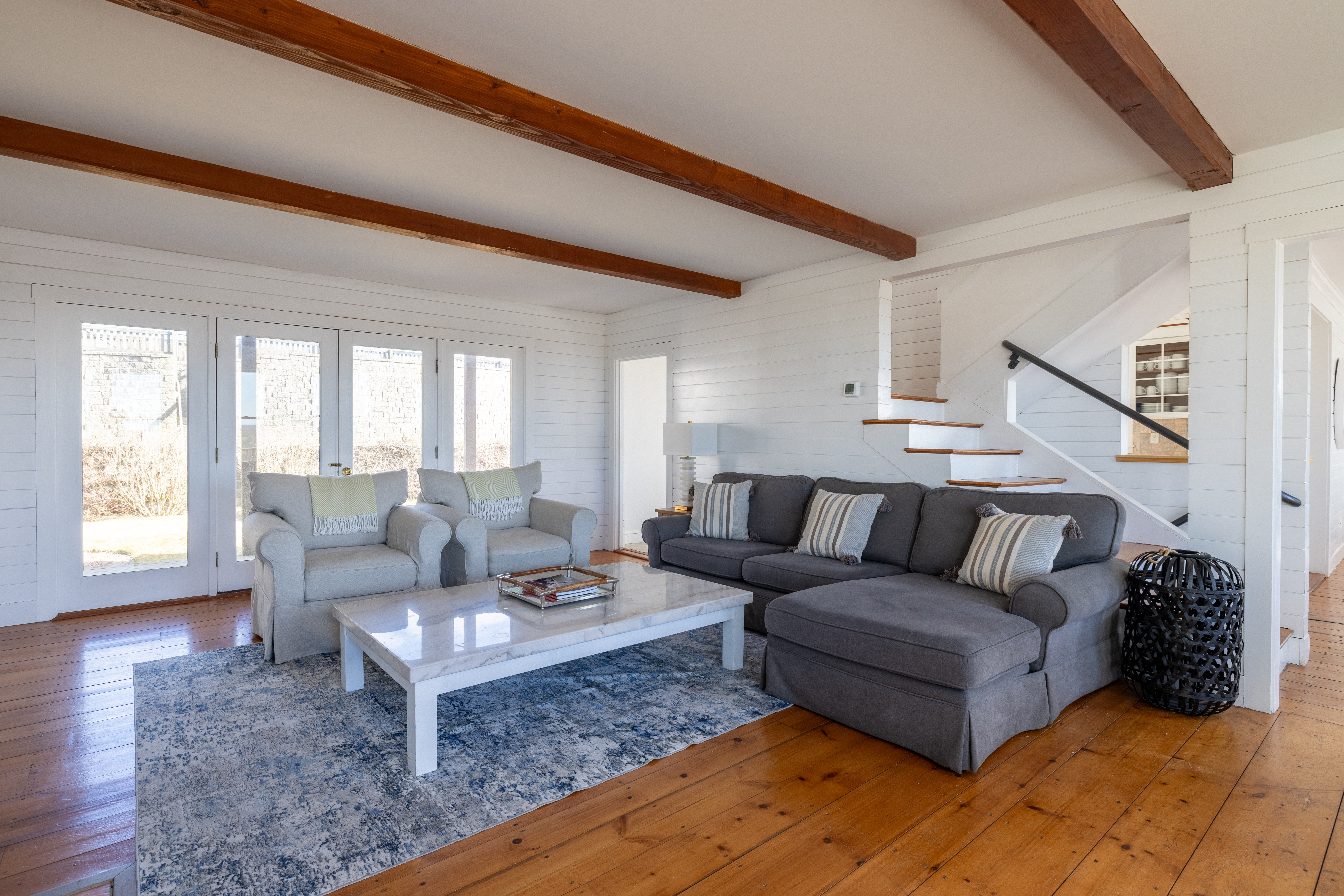 116 Baxter Road Nantucket, MA 02554 - Photo 4 of 28 a living room with furniture and a large window