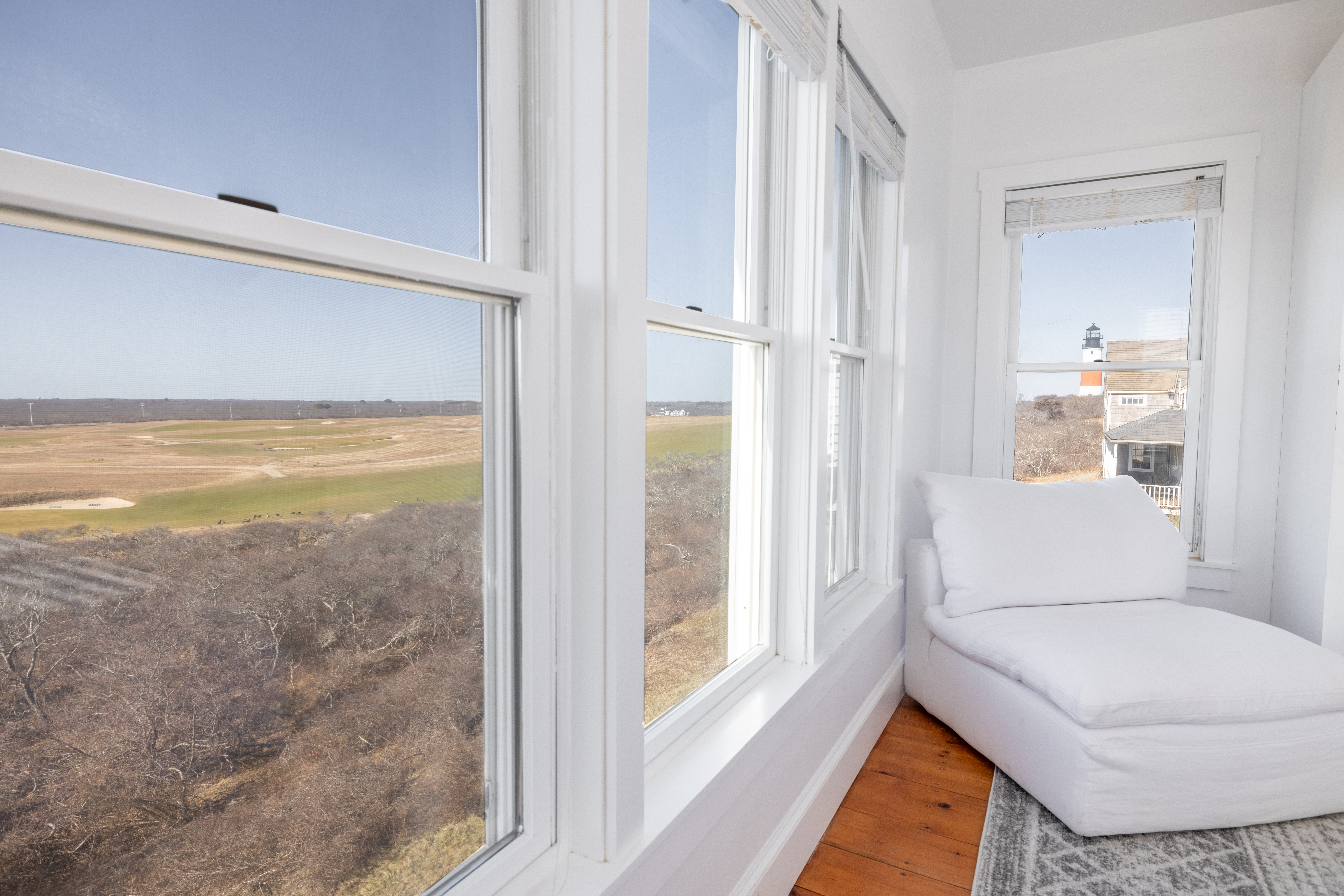 116 Baxter Road Nantucket, MA 02554 - Photo 8 of 28 a living room with furniture and a large window