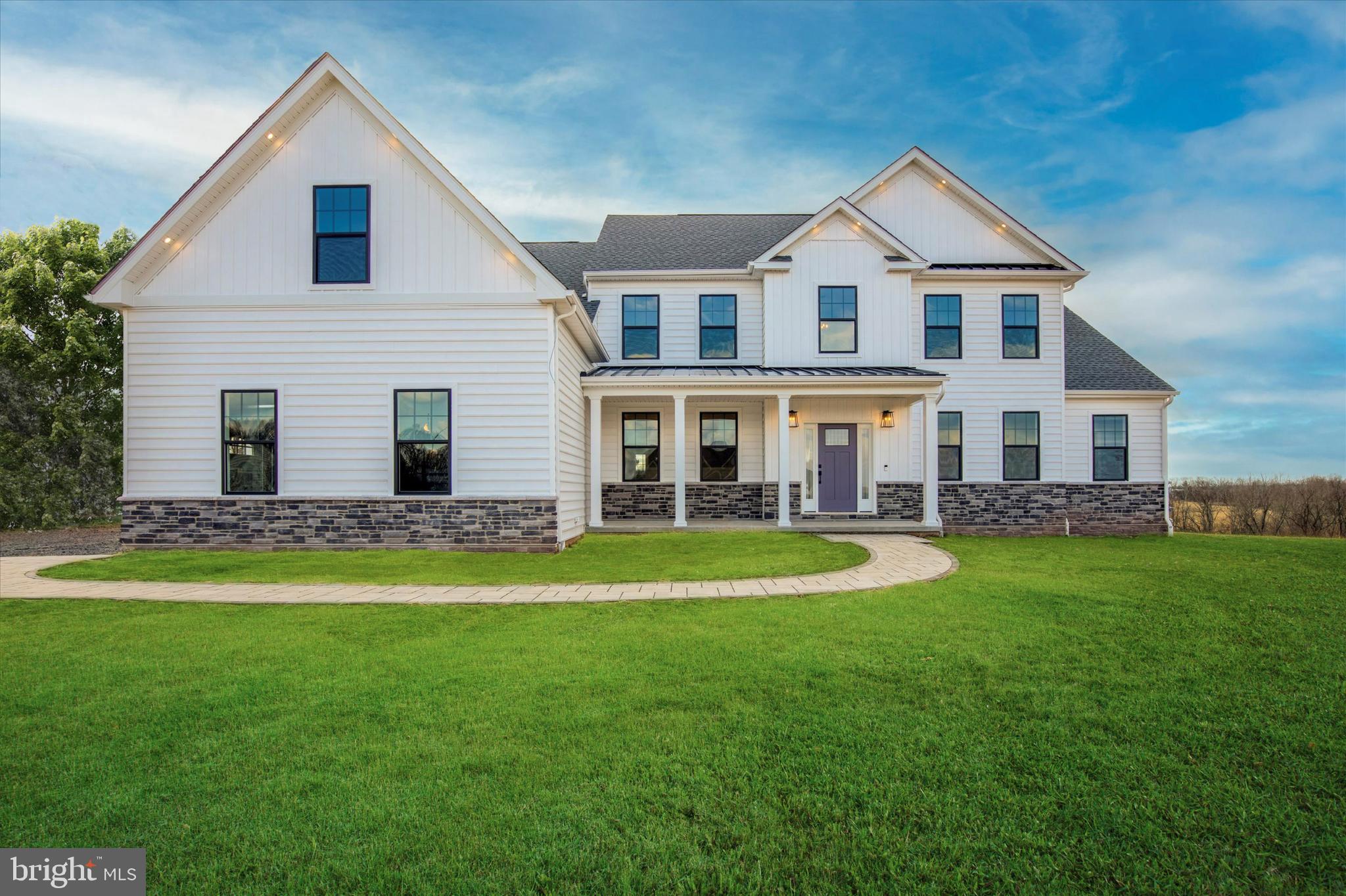 124 Schultz Road Sellersville, PA 18960 - Photo 1 of 30 a front view of a house with a yard and porch