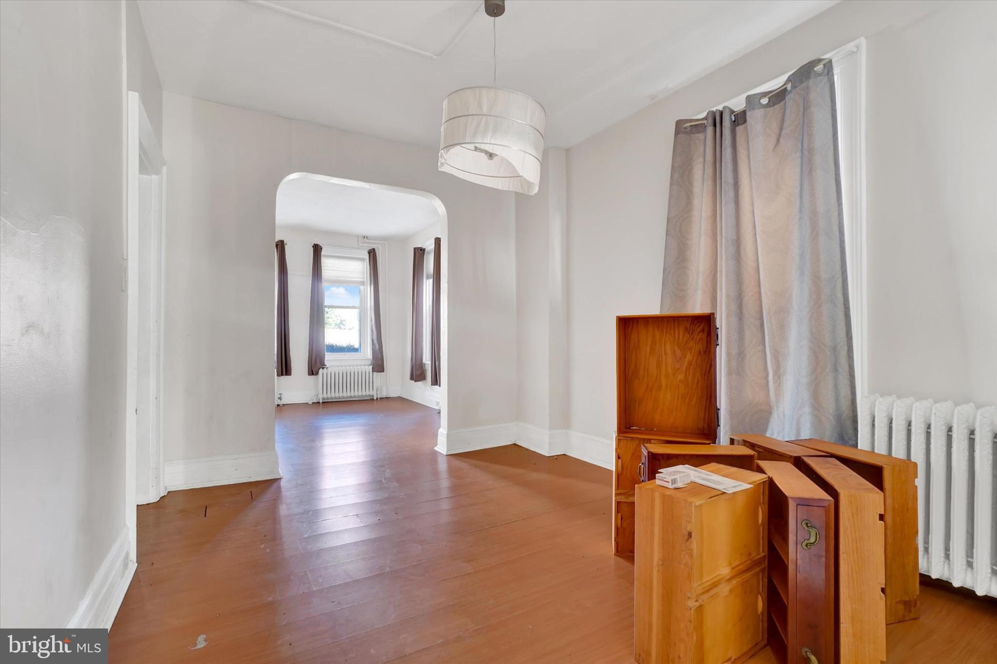 1323 North George Street York, PA 17404 - Photo 12 of 27 a view of a hallway with entryway wooden floor and windows