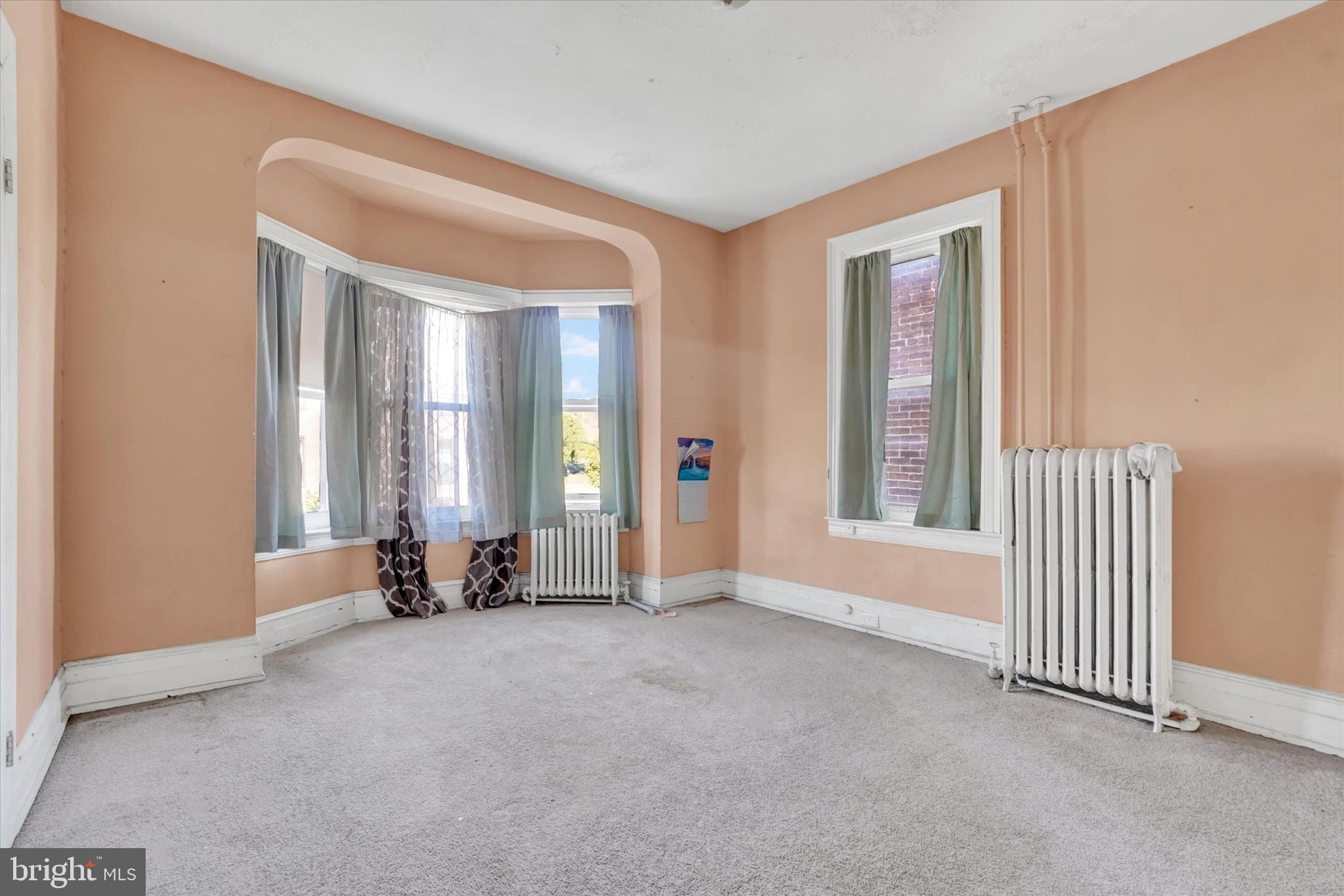 1323 North George Street York, PA 17404 - Photo 14 of 27 an empty room with windows