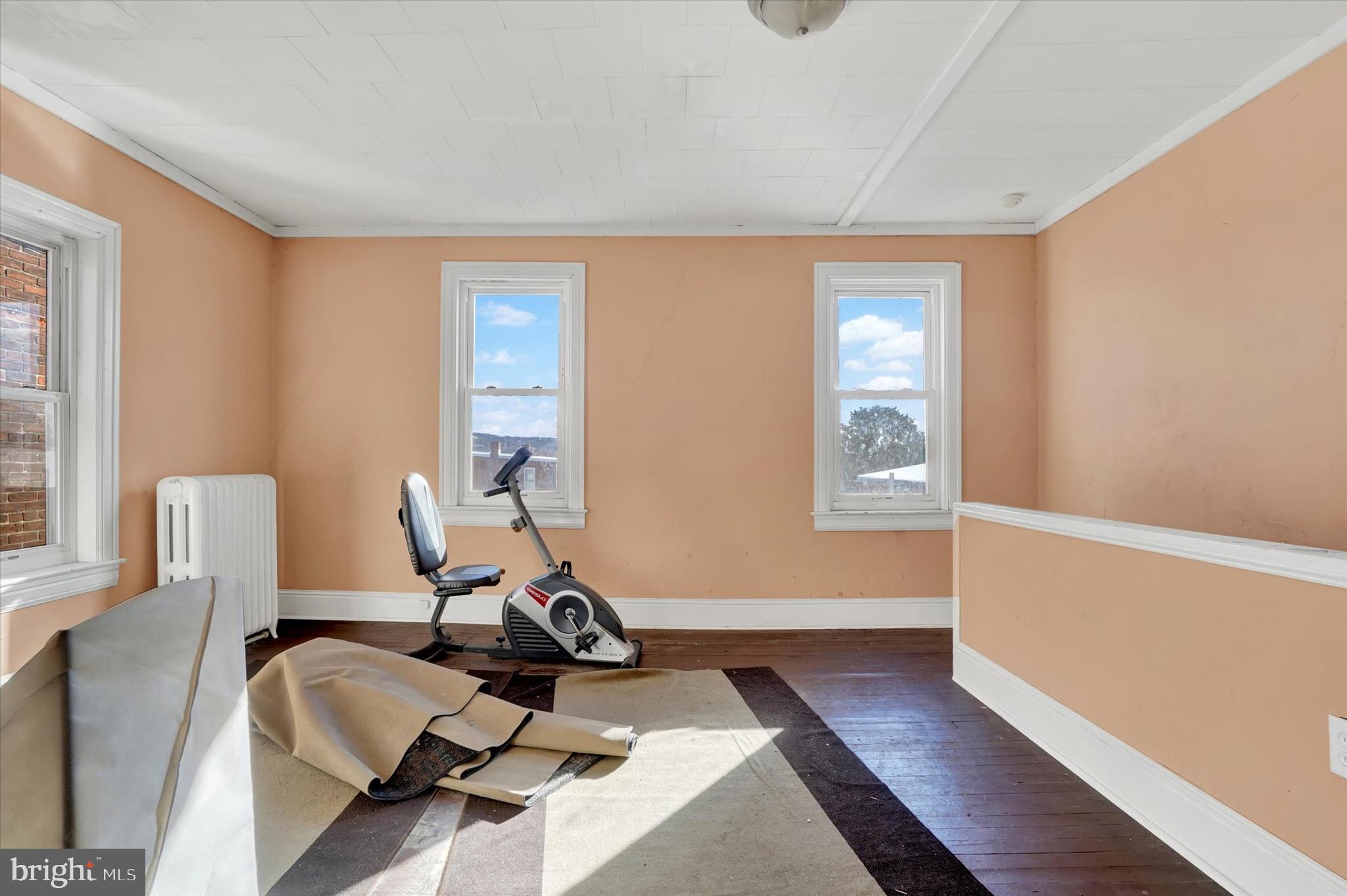 1323 North George Street York, PA 17404 - Photo 21 of 27 a workspace with furniture and a window
