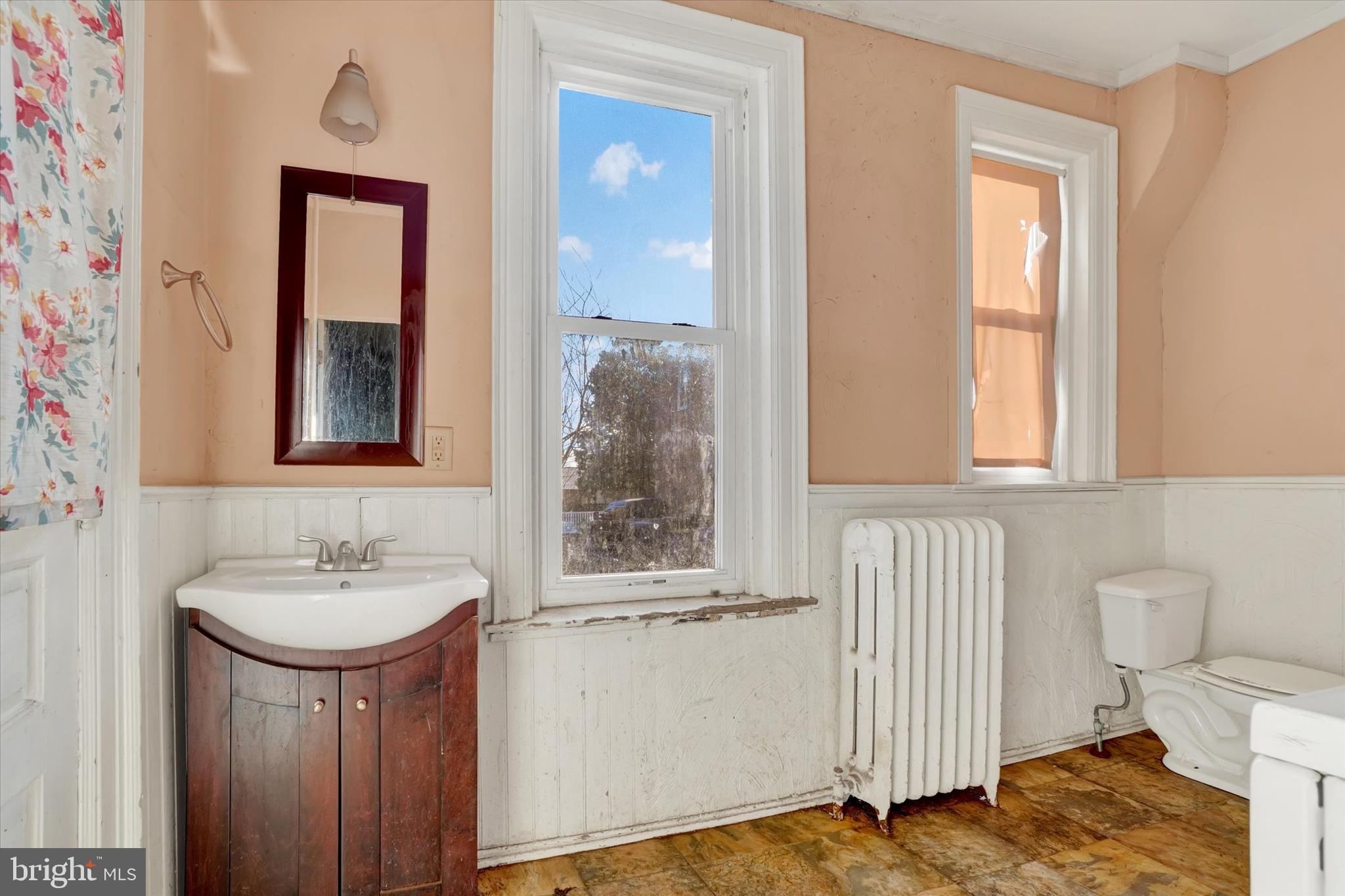 1323 North George Street York, PA 17404 - Photo 10 of 27 a bathroom with a sink and a mirror