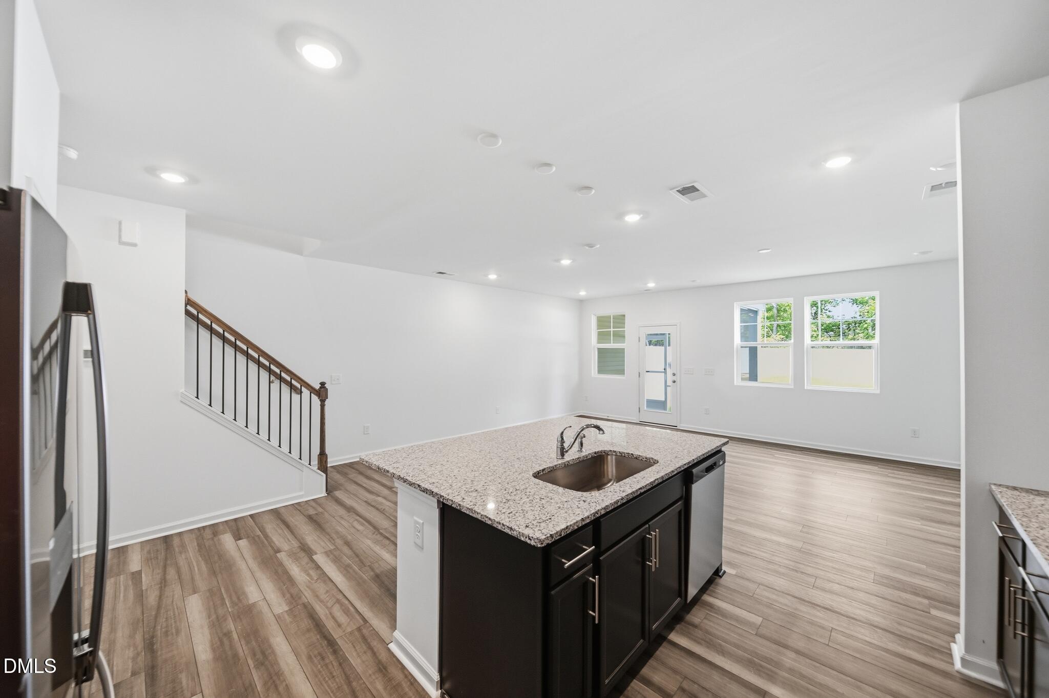 216 Tree Moss Court Rolesville, NC 27571 - Photo 11 of 31 15_216_Tree_Moss_Ct-Kitchen-2143