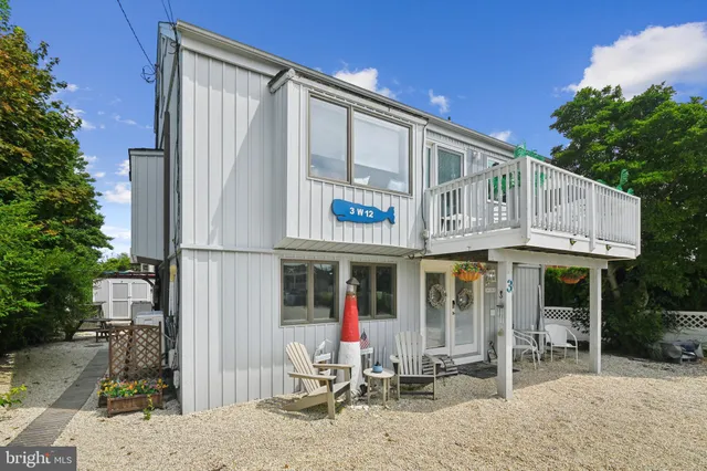 a front view of a house with patio