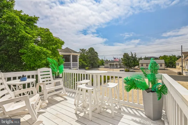 a view of a chairs and table on the terrace