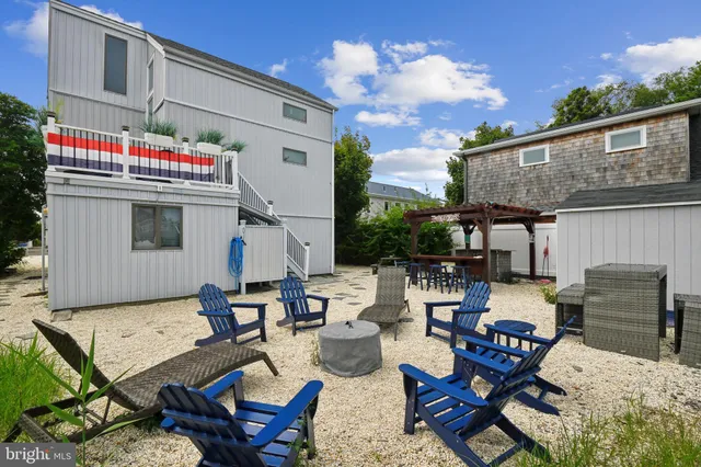 a view of a chairs and table in a patio