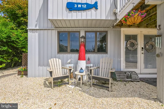 a chair and table in front of a building