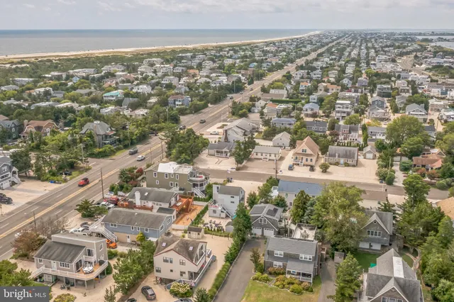 an aerial view of residential building and parking space