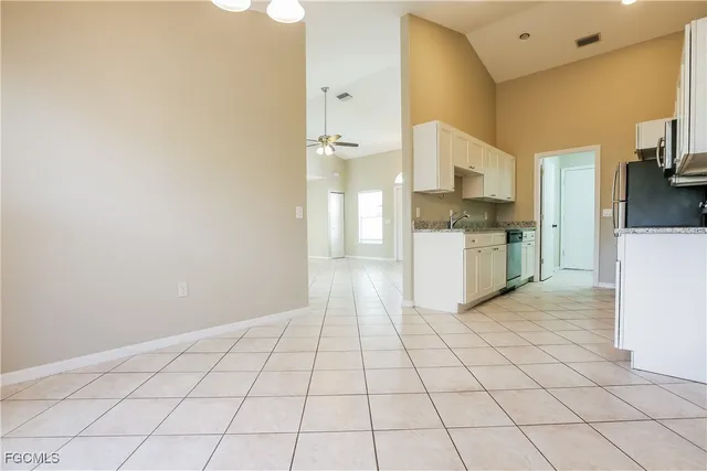 a view of a kitchen with a sink