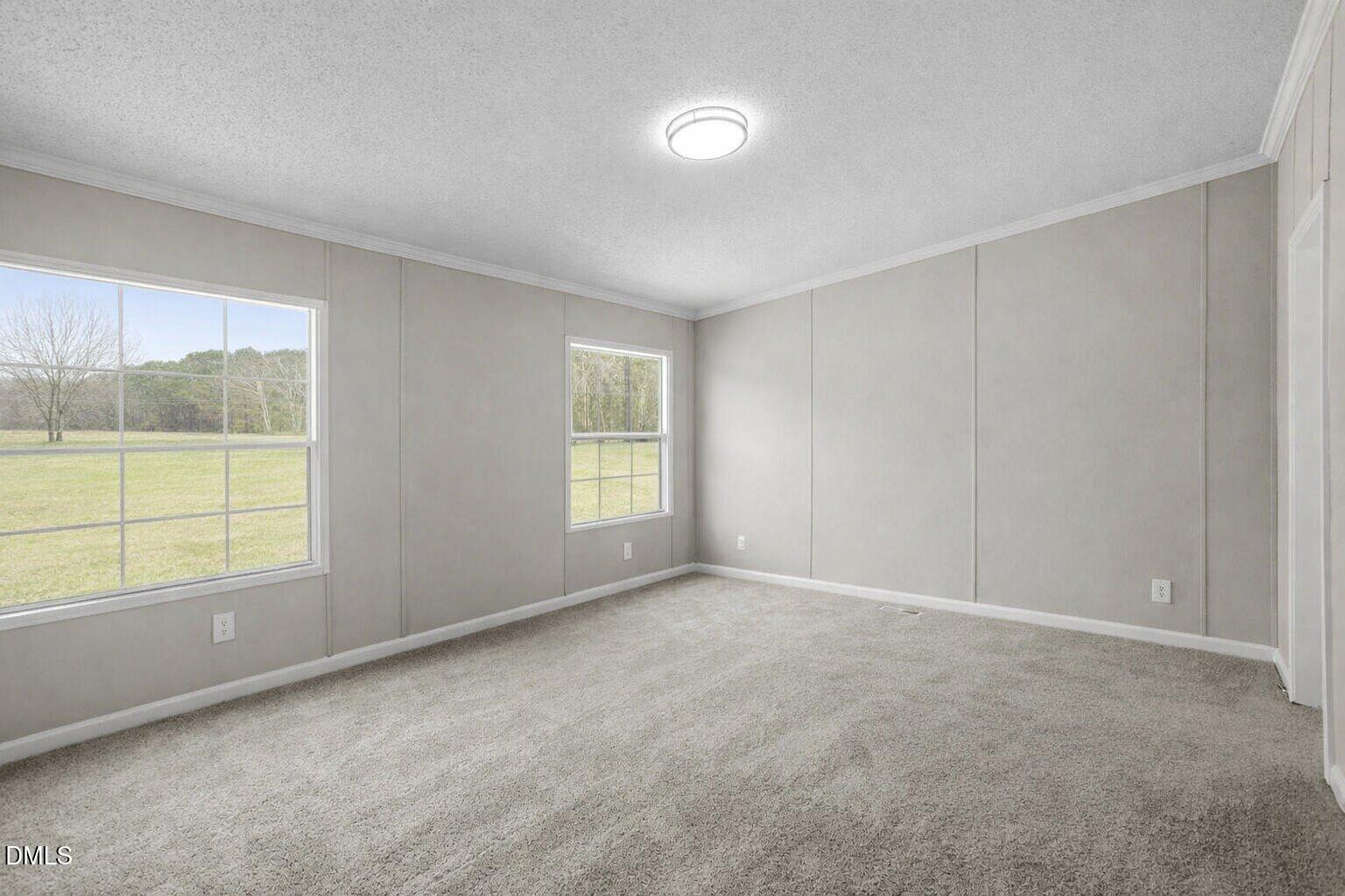 10965 Beaver Dam Road Middlesex, NC 27557 - Photo 13 of 24 a view of an empty room with a window