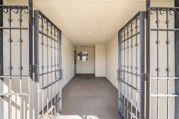 a view of staircase with wooden floor and windows