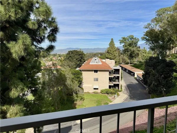 a view of a balcony with city view