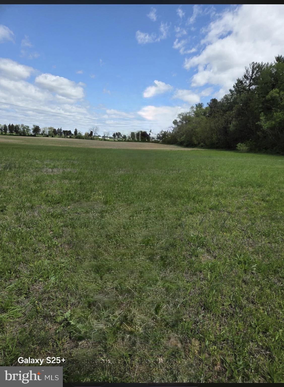 416 Watsons Mill Road Elmer, NJ 08318 - Photo 5 of 7 a view of a city with sunset in background