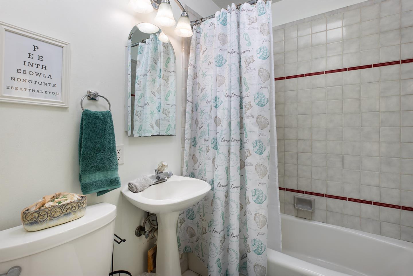 19220 Mallory Canyon Road Salinas, CA 93907 - Photo 21 of 29 a bathroom with a sink toilet and shower
