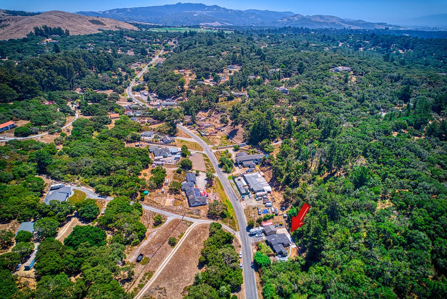 19220 Mallory Canyon Road Salinas, CA 93907 - Photo 4 of 29 an aerial view of residential houses with outdoor space and trees