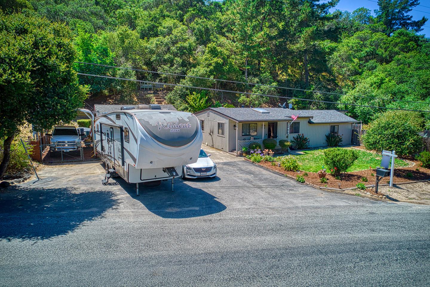 19220 Mallory Canyon Road Salinas, CA 93907 - Photo 5 of 29 a view of a patio with a table and chairs under an umbrella