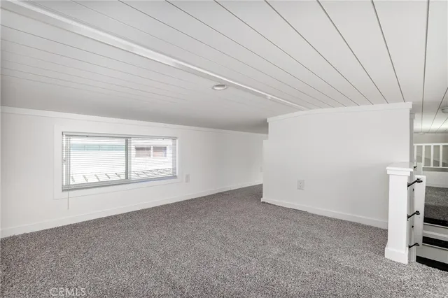 en empty room with windows