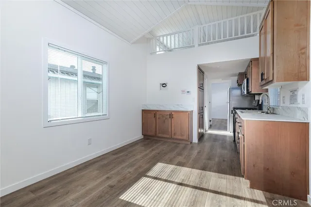 a view of a kitchen from the hallway