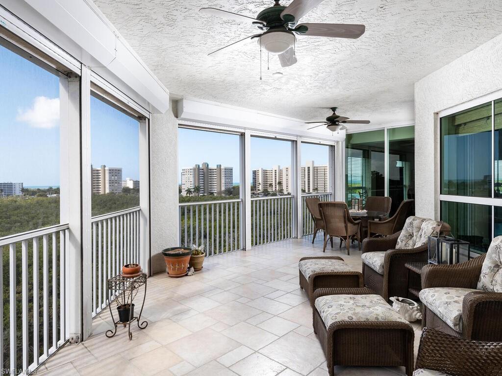295 Grande Way, Unit 401 Naples, FL 34110 - Photo 12 of 19 a outdoor space with patio furniture