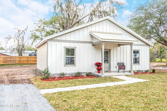 a front view of a house with entertaining space