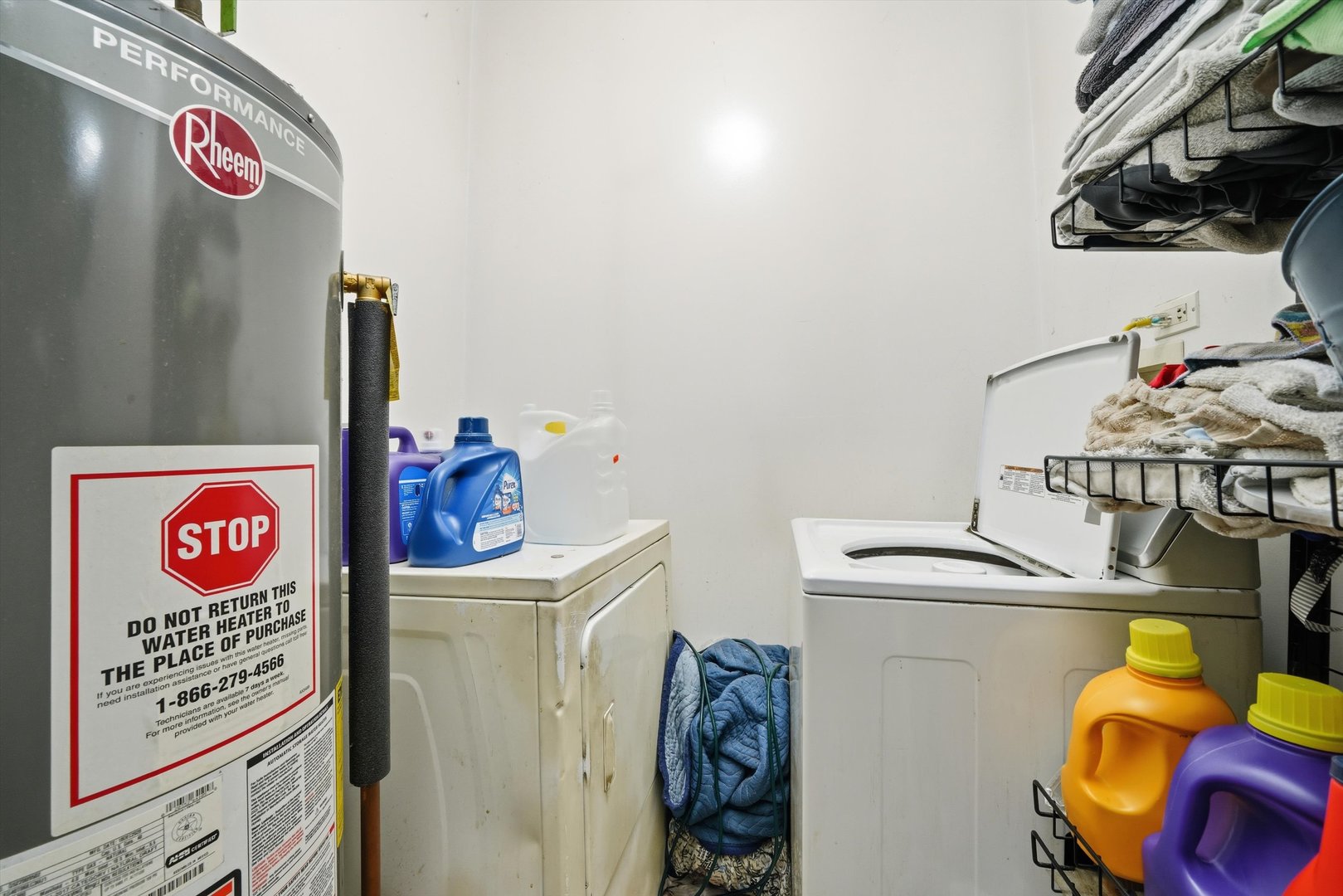 4547 South Union Avenue Chicago, IL 60609 - Photo 18 of 25 a utility room with dryer washer and a view of living room