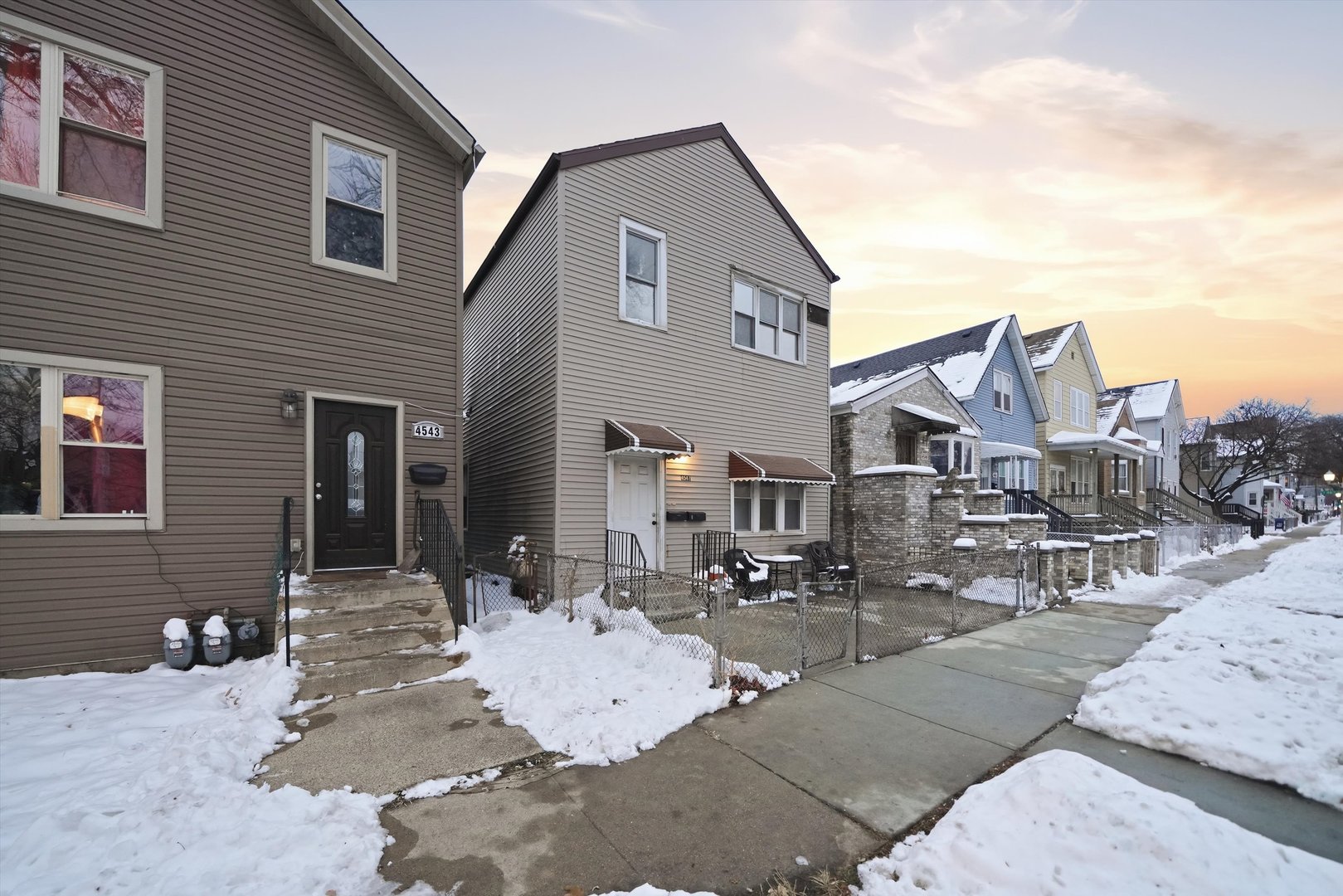 4547 South Union Avenue Chicago, IL 60609 - Photo 2 of 25 a front view of a house with a patio