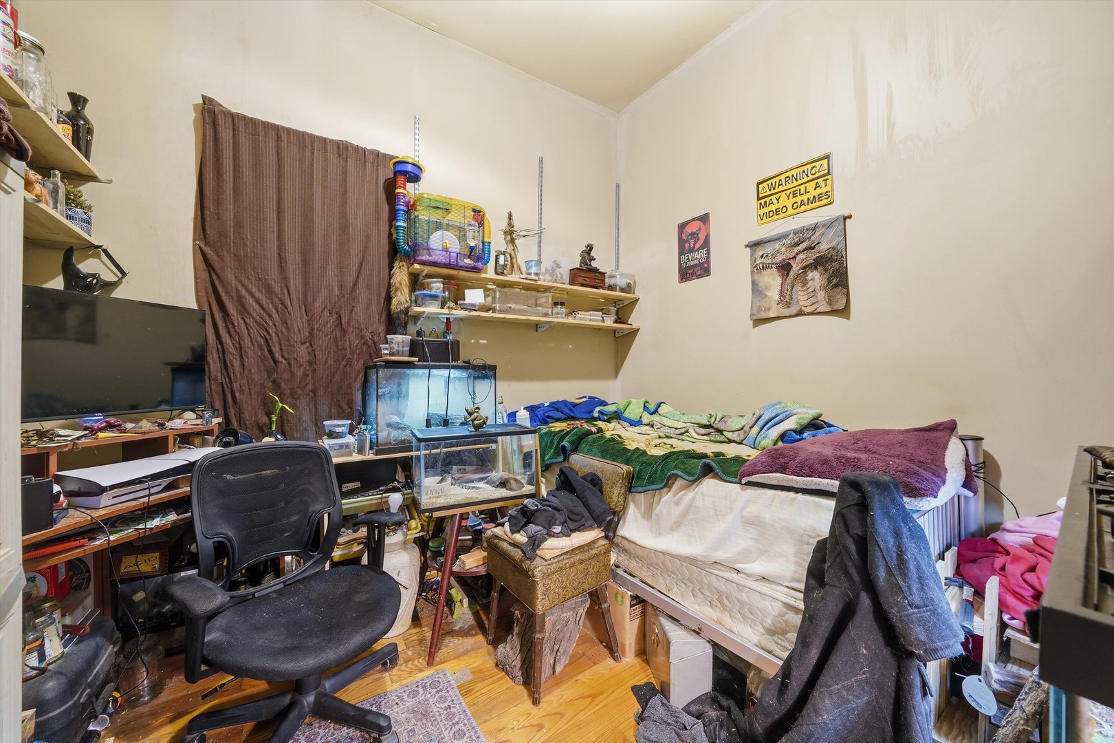 4547 South Union Avenue Chicago, IL 60609 - Photo 8 of 25 a living room with furniture and a flat screen tv