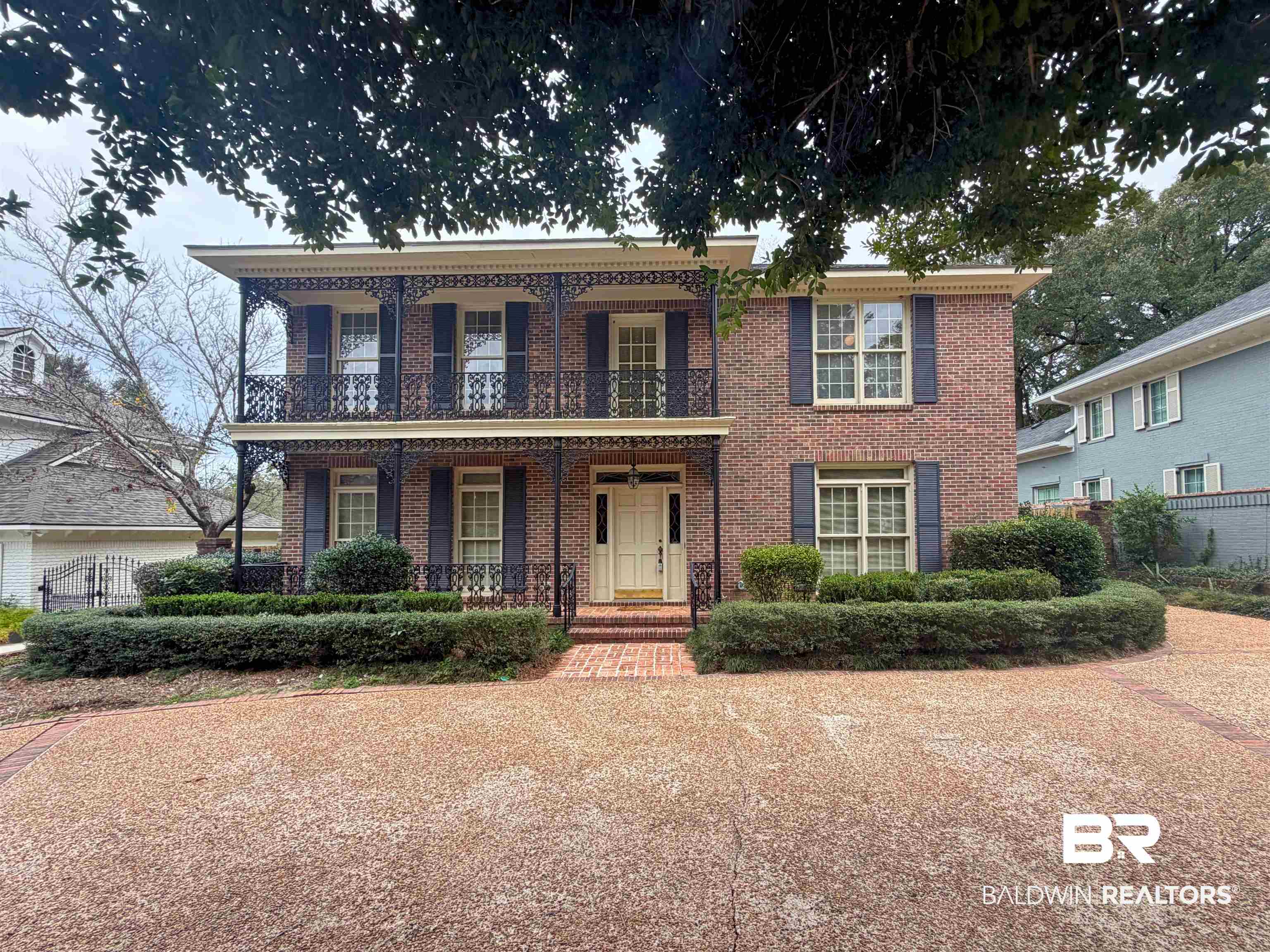 53 Warwick Road Mobile, AL 36608 - Photo 2 of 45 View of front of home with covered porch and brick siding
