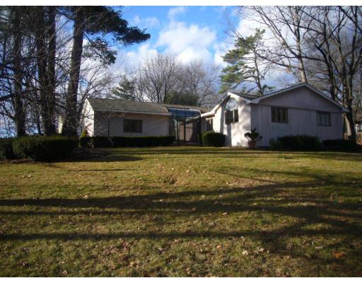 5 Valley Road Dracut, MA 01826 - Photo 1 of 8 a view of a yard in front of a house