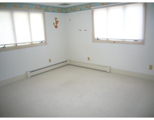 5 Valley Road Dracut, MA 01826 - Photo 4 of 8 an empty room with a window
