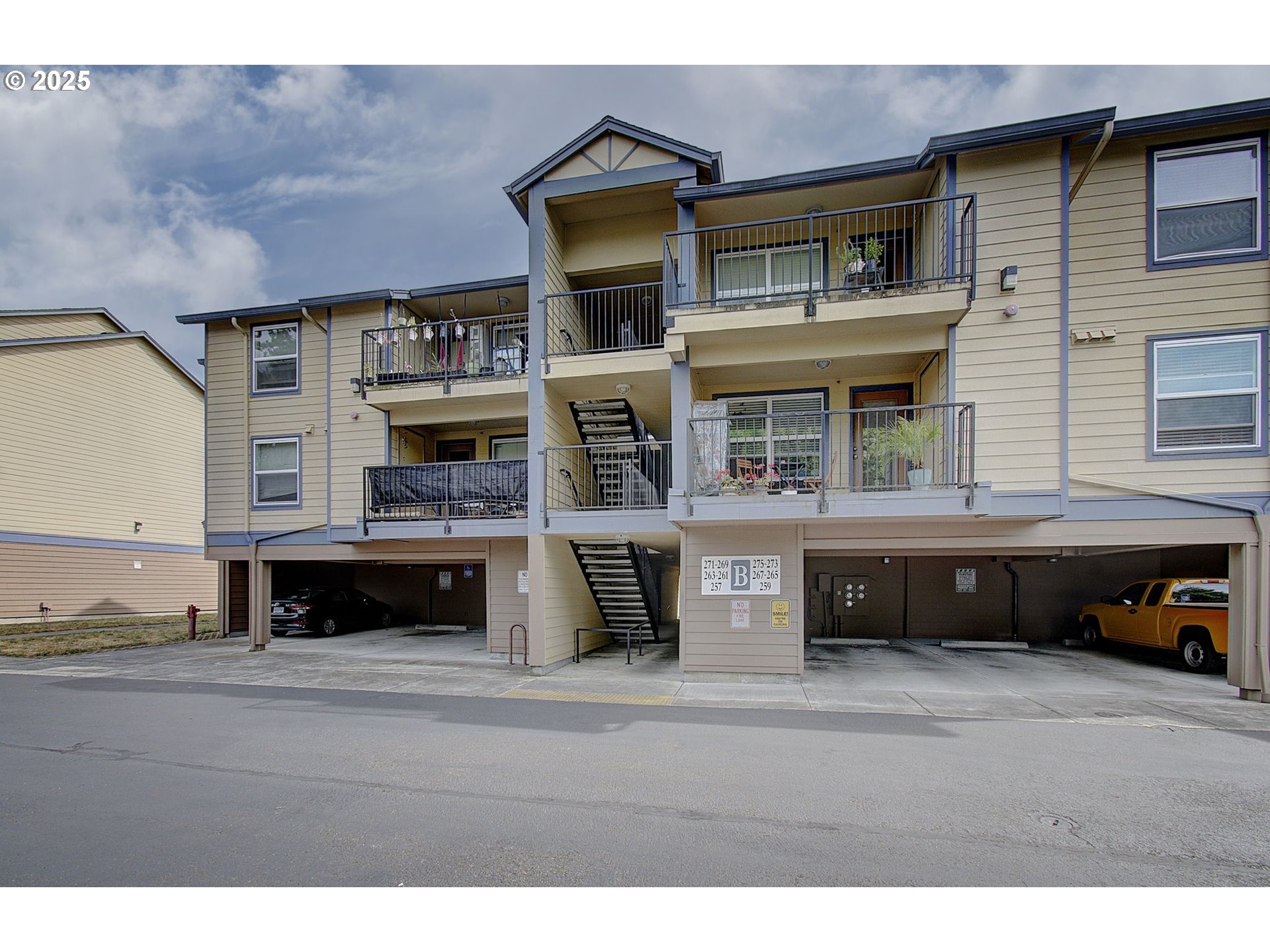 275 Southeast 162nd Avenue Portland, OR 97233 - Photo 1 of 22 a front view of a house with a garage