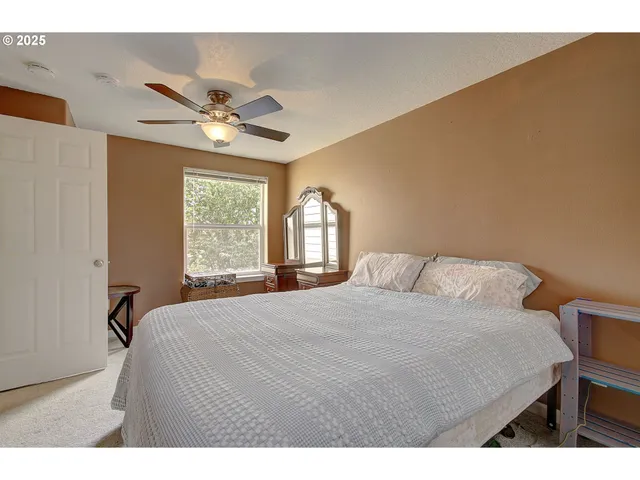 a balcony with table and chairs