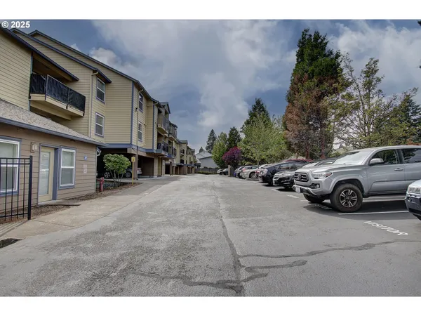 a view of a house with a street