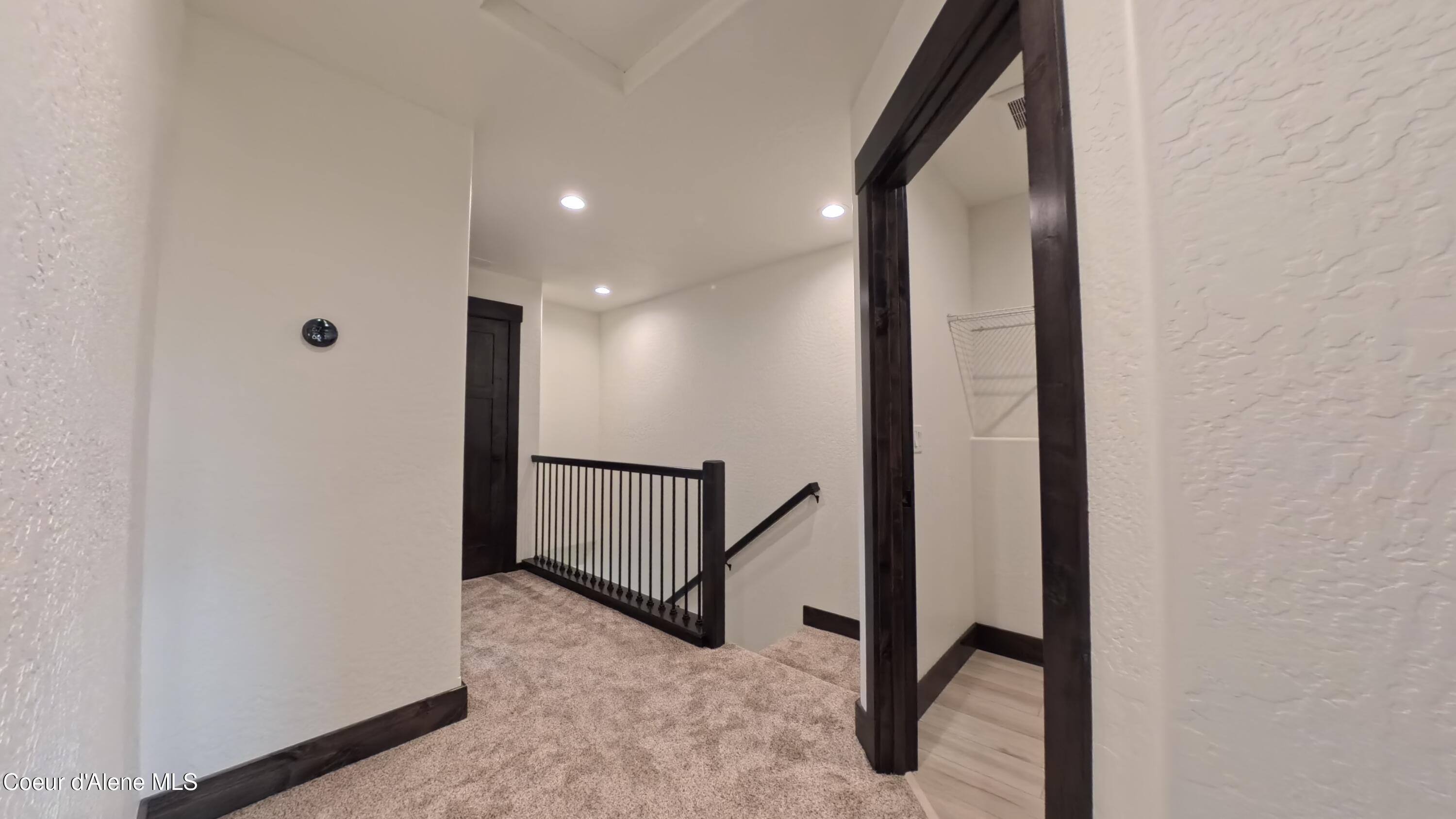214 East Lobo Loop Hayden, ID 83835 - Photo 11 of 20 Top of Stairs - Laundry