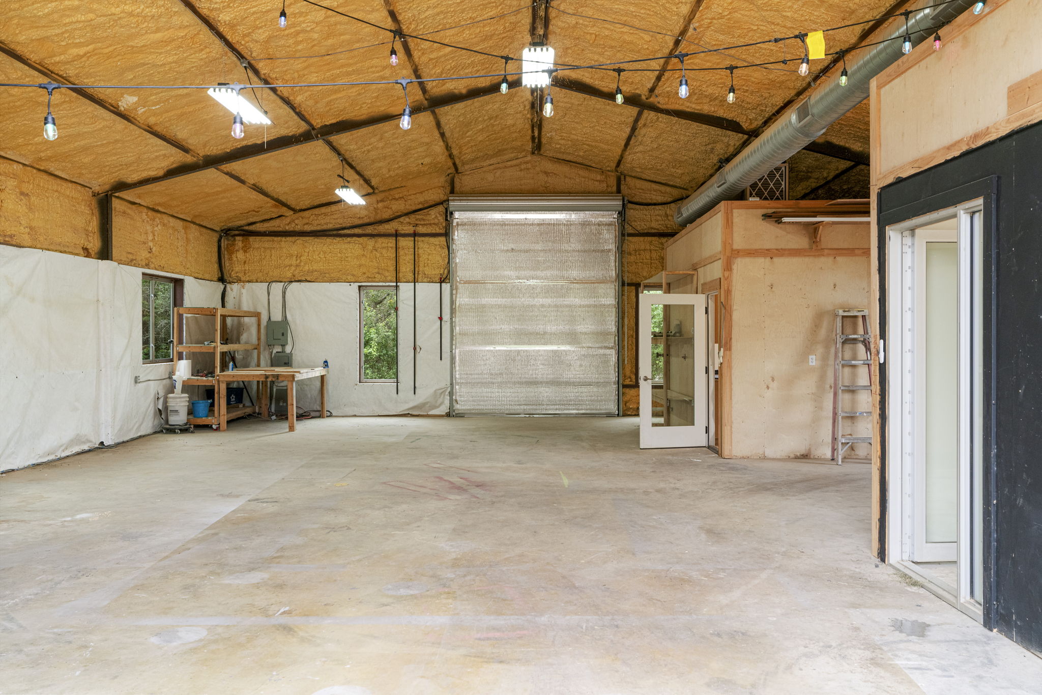 1129 Cedar Pass Road Driftwood, TX 78619 - Photo 35 of 40 This is a 60X40 building with plumbing for extra kitchen and bath!