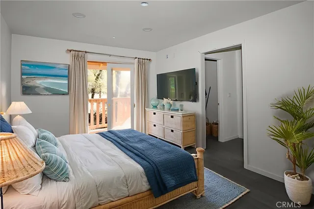 a view of a house with a yard and deck